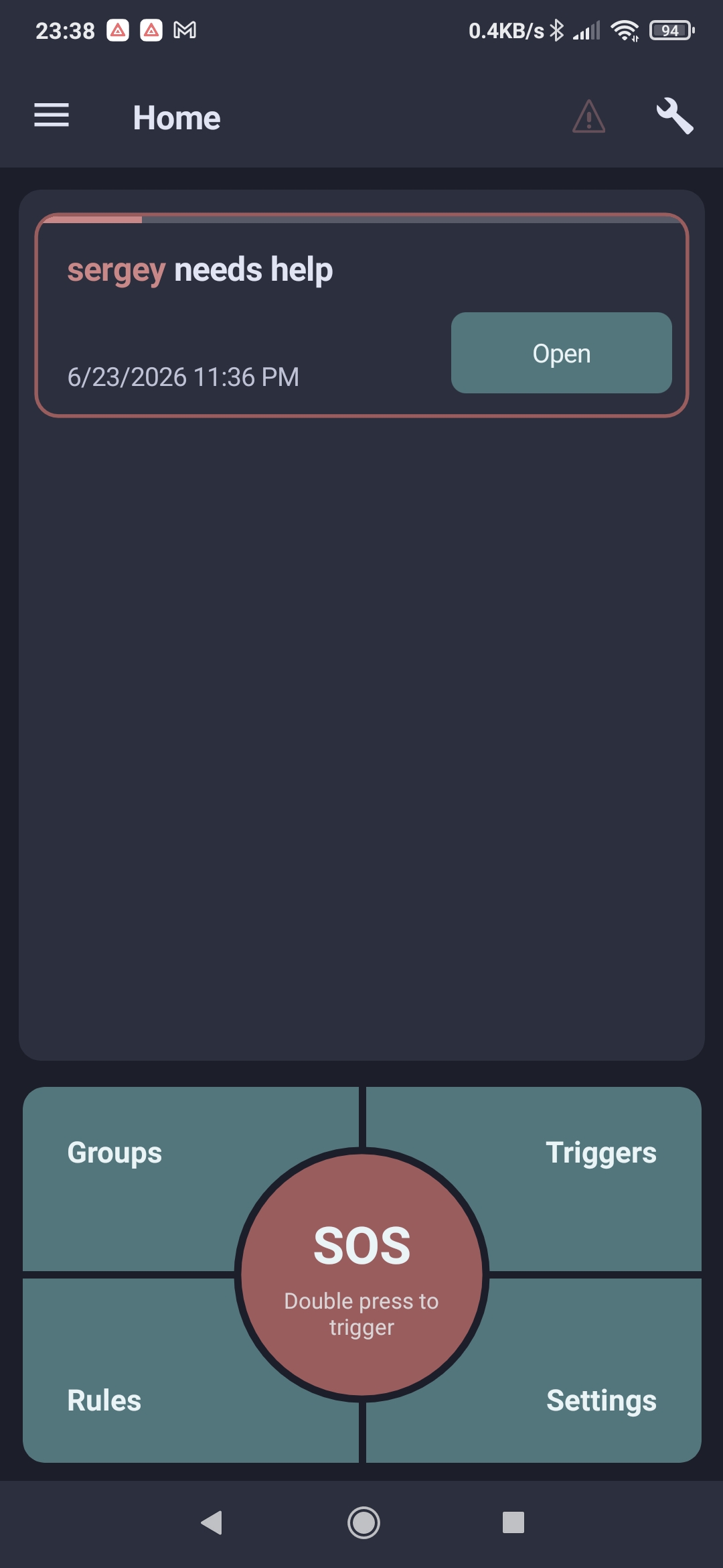 Home screen with SOS button and active incident alert